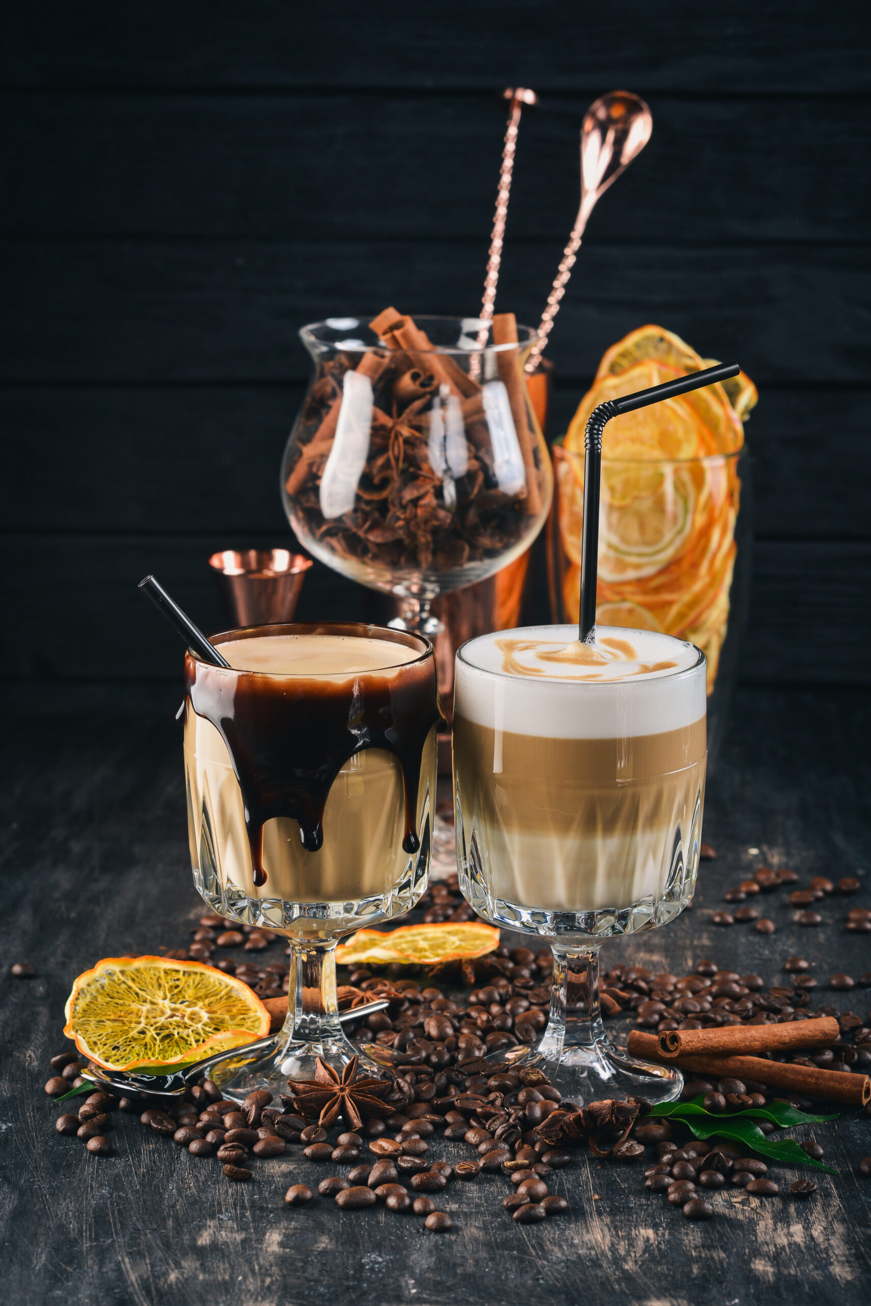 two cups coffee with milk cream black wooden background top view copy space